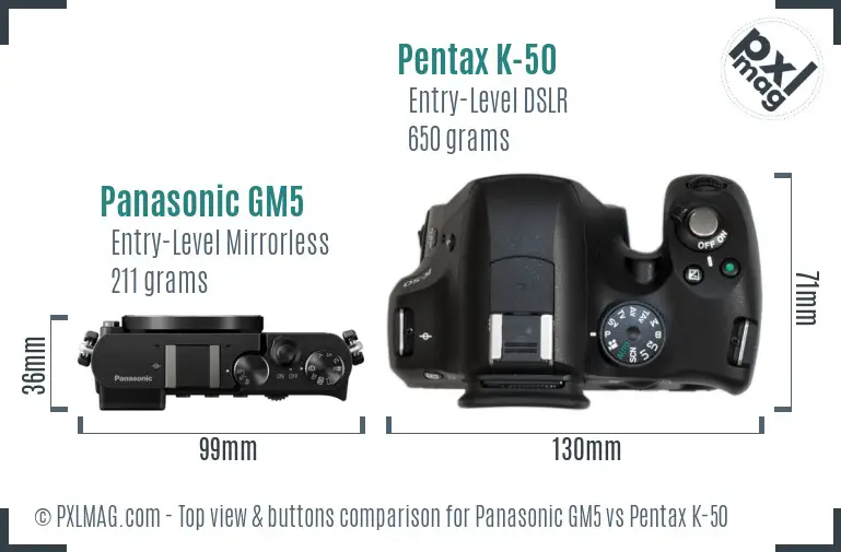 Panasonic GM5 vs Pentax K-50 top view buttons comparison
