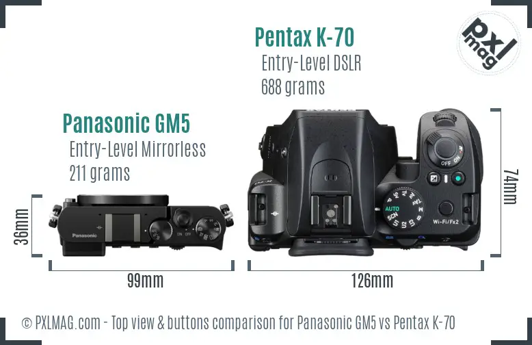 Panasonic GM5 vs Pentax K-70 top view buttons comparison