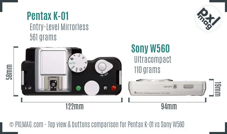 Pentax K-01 vs Sony W560 top view buttons comparison