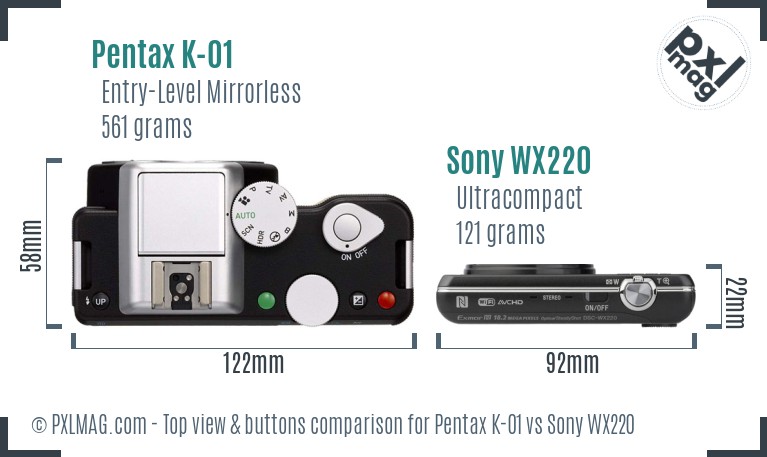 Pentax K-01 vs Sony WX220 top view buttons comparison