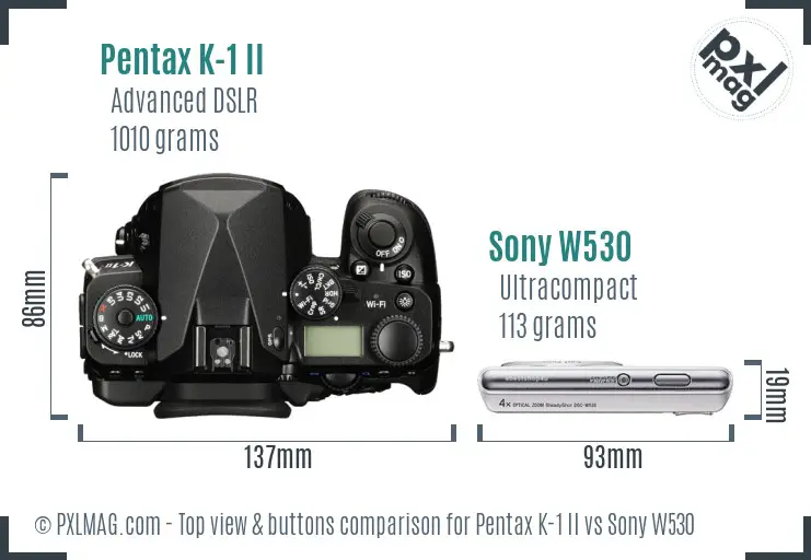 Pentax K-1 II vs Sony W530 top view buttons comparison