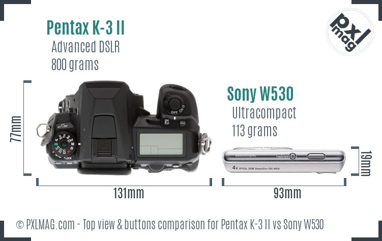 Pentax K-3 II vs Sony W530 top view buttons comparison