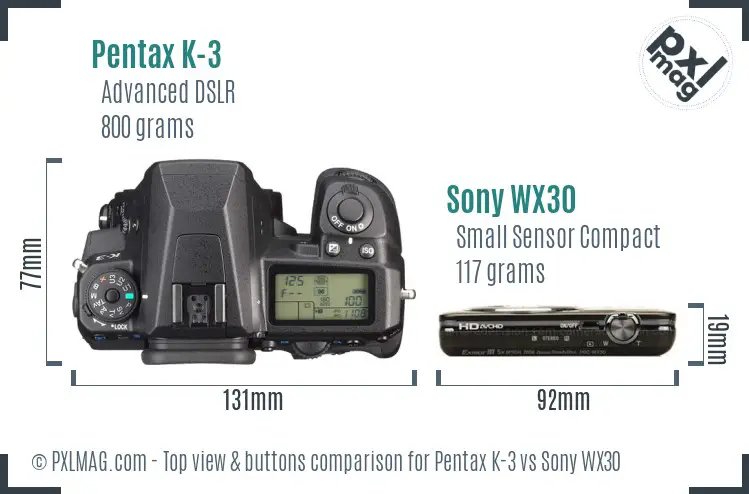Pentax K-3 vs Sony WX30 top view buttons comparison