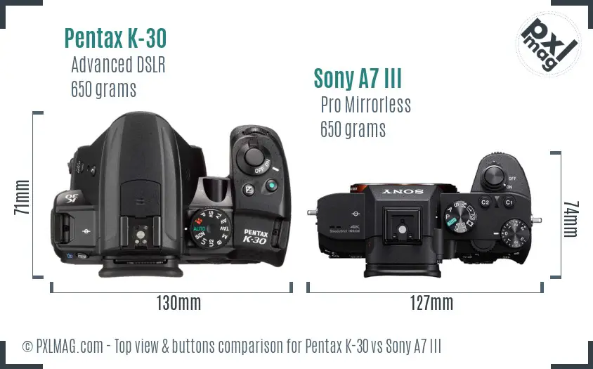 Pentax K-30 vs Sony A7 III top view buttons comparison Pentax K-30 vs Sony A7 III top view buttons comparison