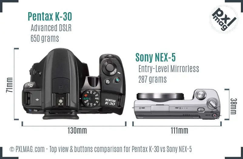 Pentax K-30 vs Sony NEX-5 top view buttons comparison