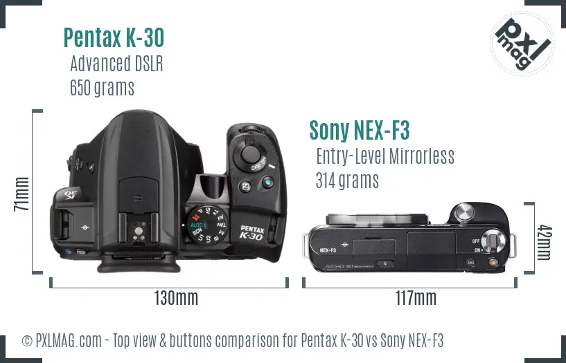 Pentax K-30 vs Sony NEX-F3 top view buttons comparison