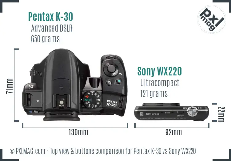 Pentax K-30 vs Sony WX220 top view buttons comparison Pentax K-30 vs Sony WX220 top view buttons comparison
