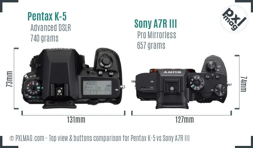 Pentax K-5 vs Sony A7R III top view buttons comparison