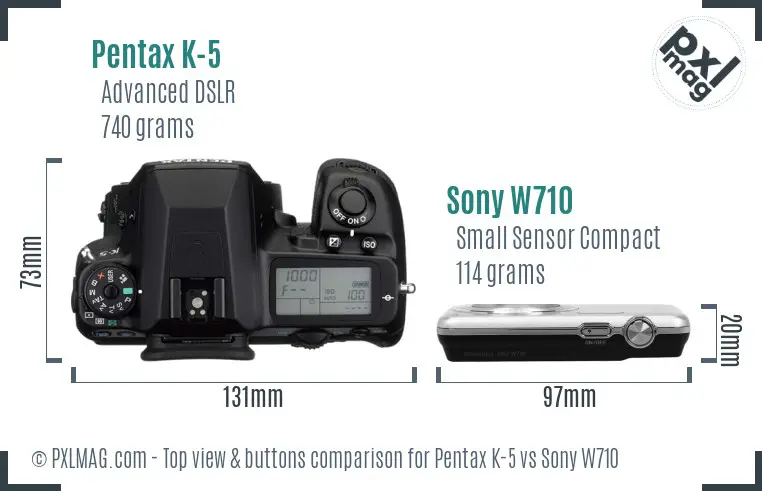 Pentax K-5 vs Sony W710 top view buttons comparison