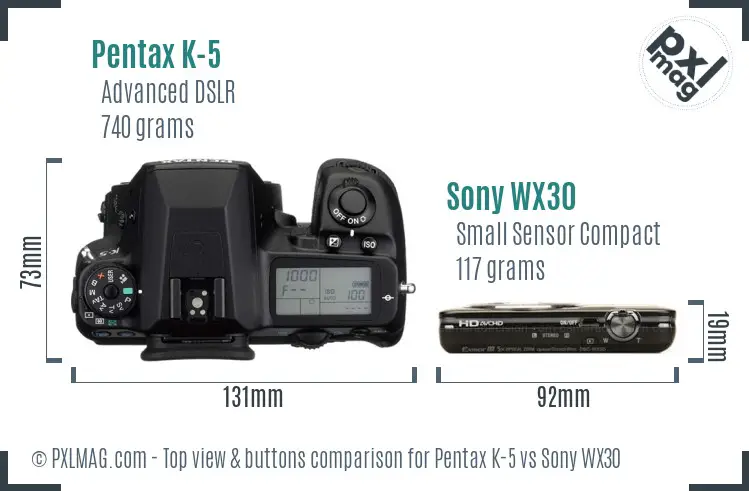 Pentax K-5 vs Sony WX30 top view buttons comparison