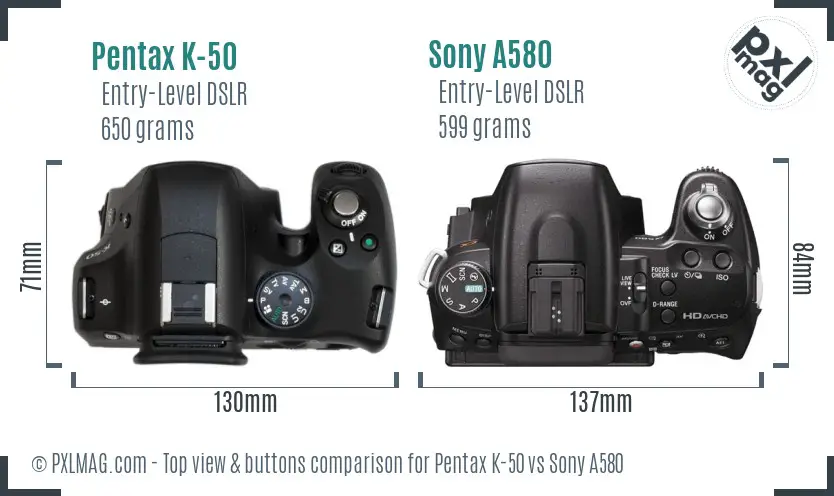 Pentax K-50 vs Sony A580 top view buttons comparison
