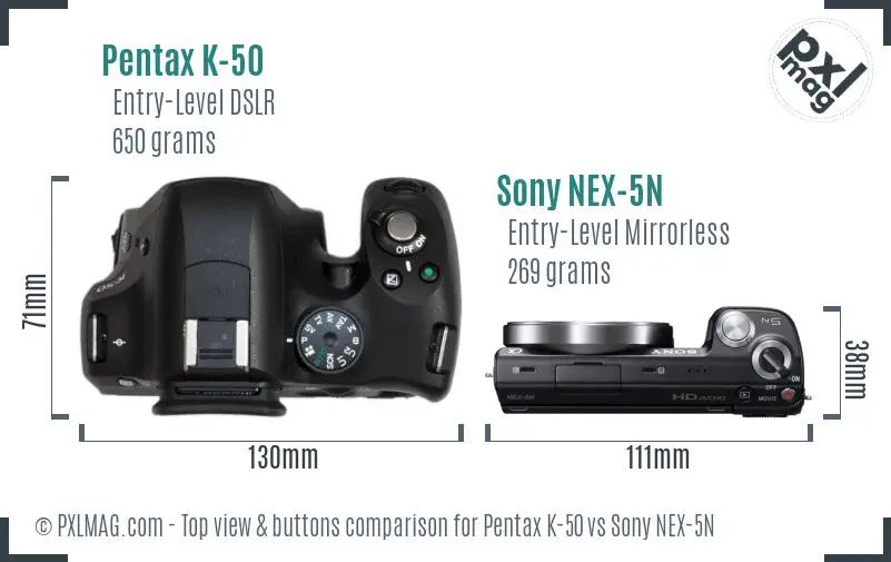 Pentax K-50 vs Sony NEX-5N top view buttons comparison