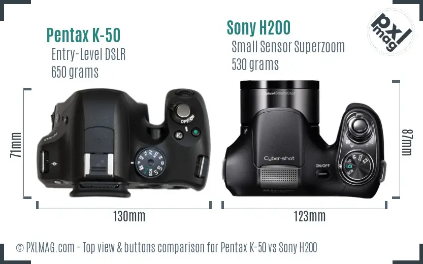 Pentax K-50 vs Sony H200 top view buttons comparison