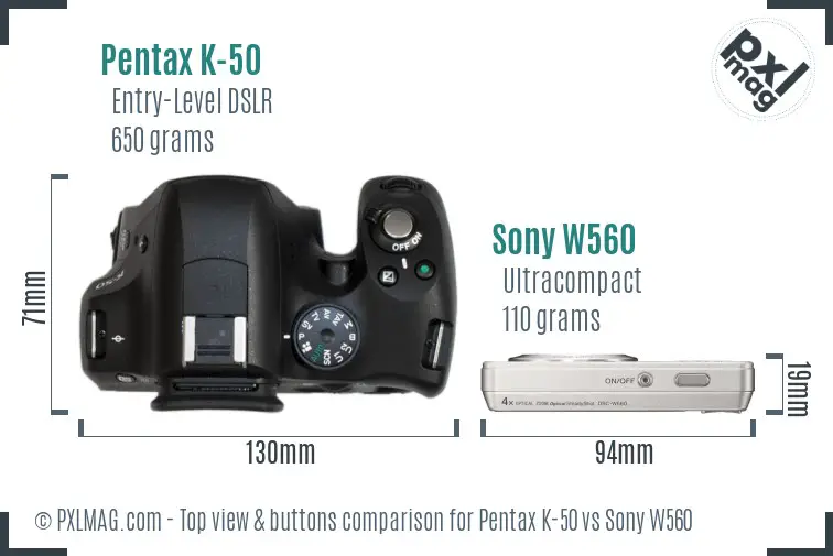 Pentax K-50 vs Sony W560 top view buttons comparison
