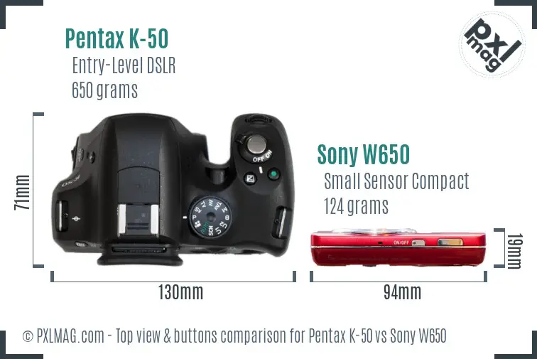Pentax K-50 vs Sony W650 top view buttons comparison Pentax K-50 vs Sony W650 top view buttons comparison
