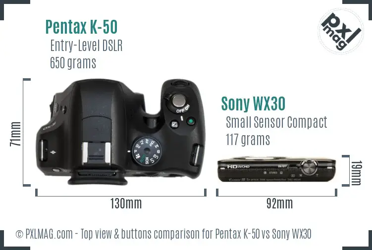 Pentax K-50 vs Sony WX30 top view buttons comparison