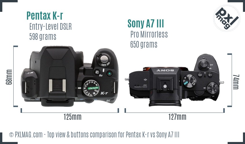 Pentax K-r vs Sony A7 III top view buttons comparison