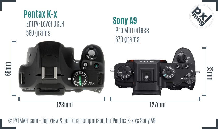 Pentax K-x vs Sony A9 top view buttons comparison