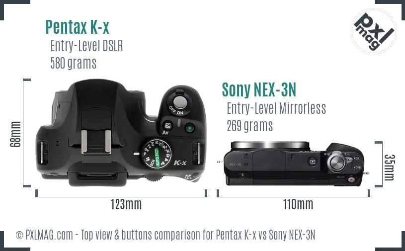 Pentax K-x vs Sony NEX-3N top view buttons comparison