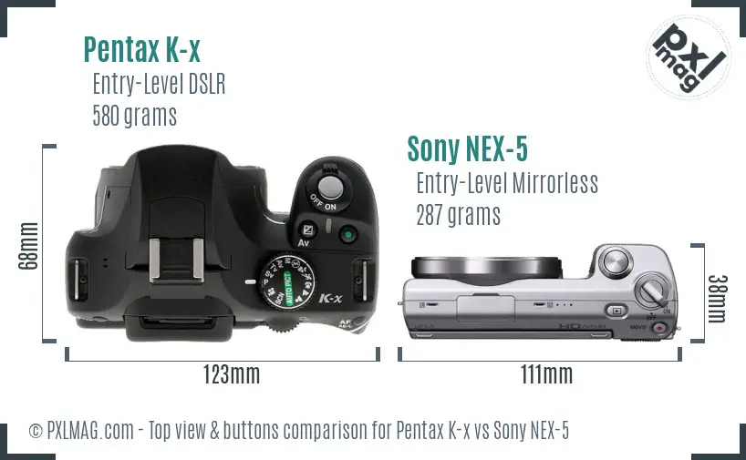 Pentax K-x vs Sony NEX-5 top view buttons comparison