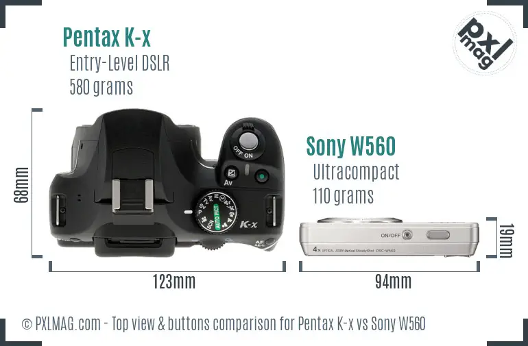 Pentax K-x vs Sony W560 top view buttons comparison Pentax K-x vs Sony W560 top view buttons comparison