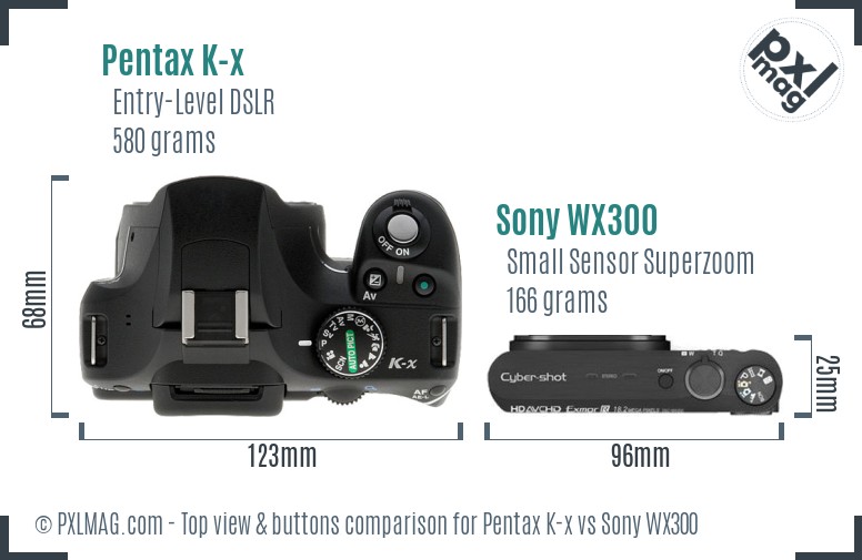 Pentax K-x vs Sony WX300 top view buttons comparison