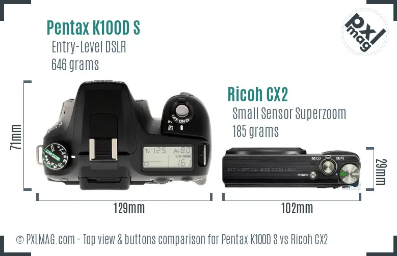 Pentax K100D S vs Ricoh CX2 top view buttons comparison