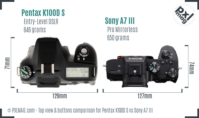 Pentax K100D S vs Sony A7 III top view buttons comparison