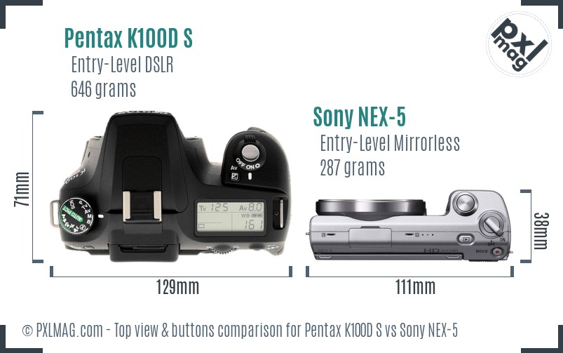 Pentax K100D S vs Sony NEX-5 top view buttons comparison