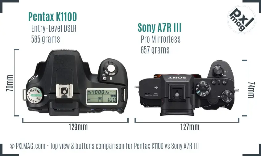 Pentax K110D vs Sony A7R III top view buttons comparison Pentax K110D vs Sony A7R III top view buttons comparison