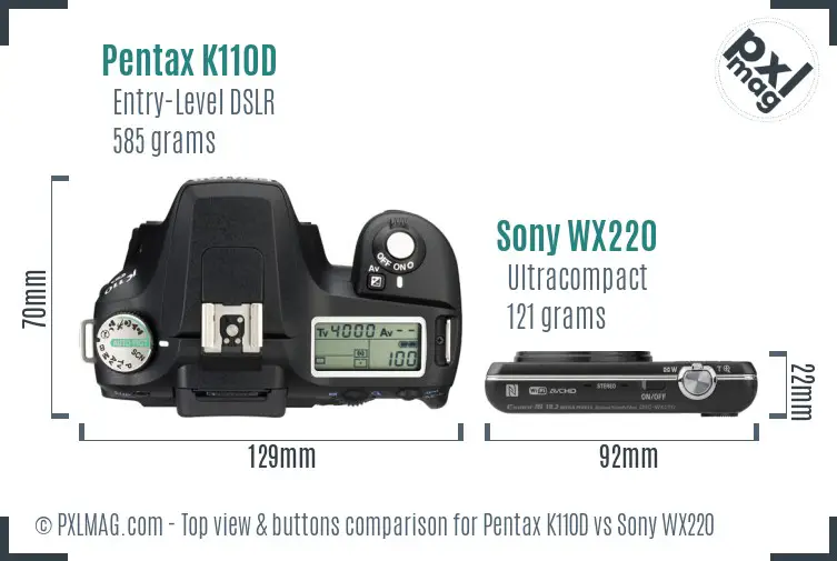 Pentax K110D vs Sony WX220 top view buttons comparison