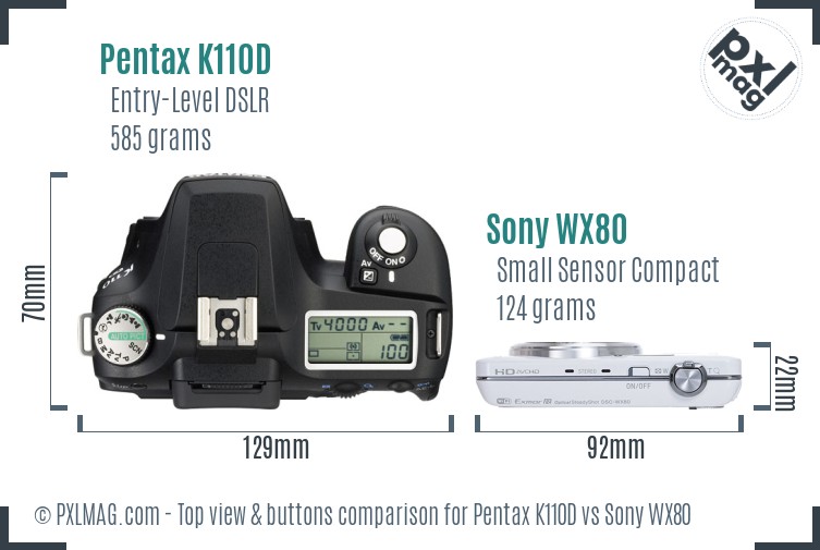 Pentax K110D vs Sony WX80 top view buttons comparison