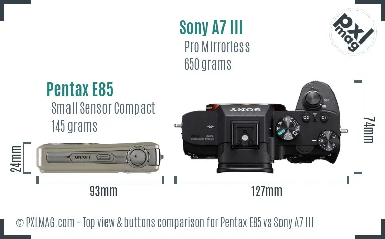 Pentax E85 vs Sony A7 III top view buttons comparison Pentax E85 vs Sony A7 III top view buttons comparison