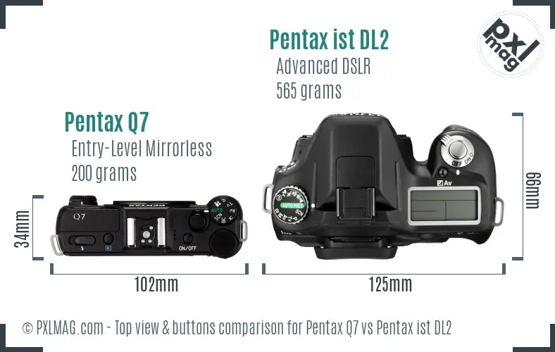 Pentax Q7 vs Pentax ist DL2 top view buttons comparison