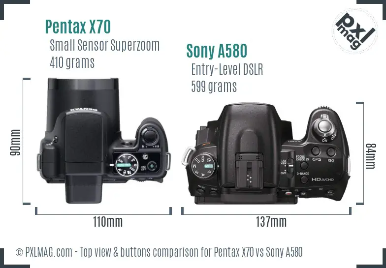 Pentax X70 vs Sony A580 top view buttons comparison