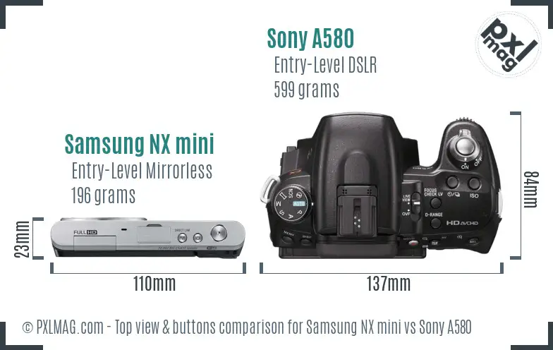 Samsung NX mini vs Sony A580 top view buttons comparison
