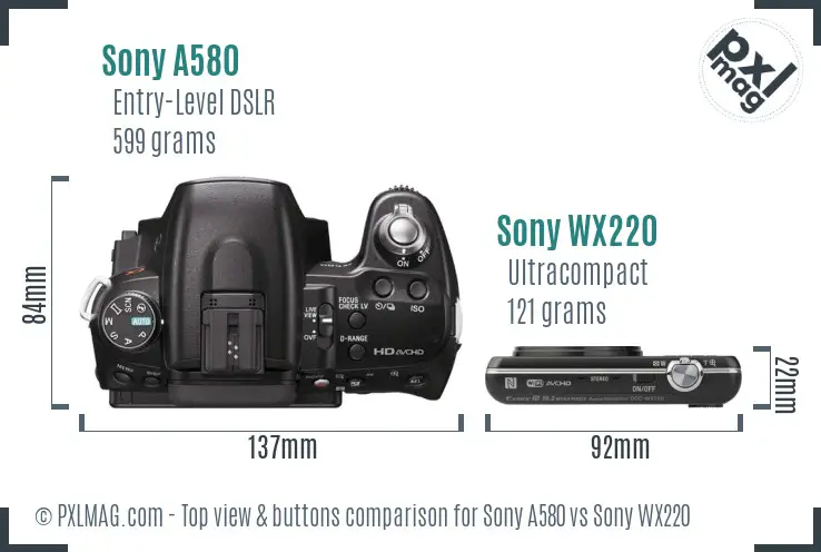 Sony A580 vs Sony WX220 top view buttons comparison
