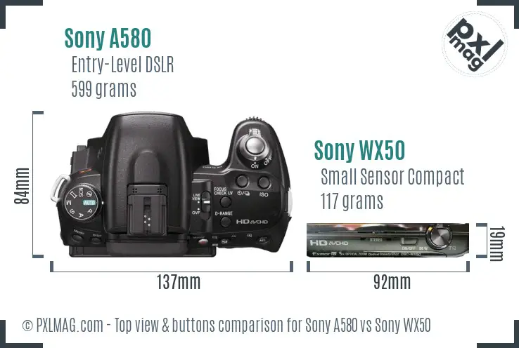 Sony A580 vs Sony WX50 top view buttons comparison