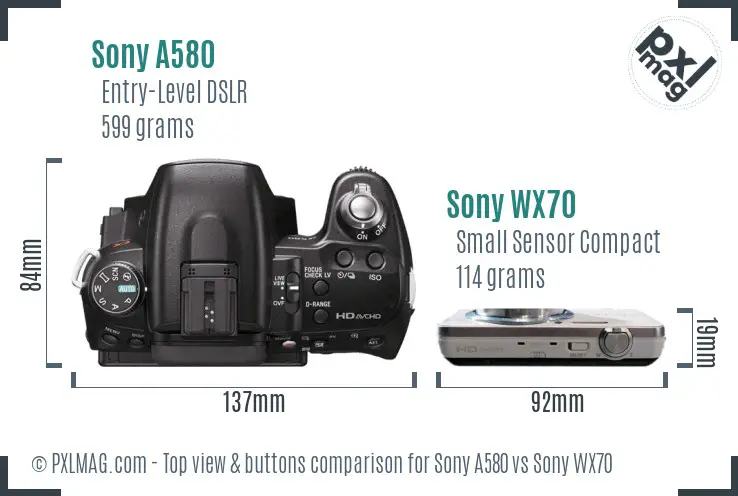 Sony A580 vs Sony WX70 top view buttons comparison